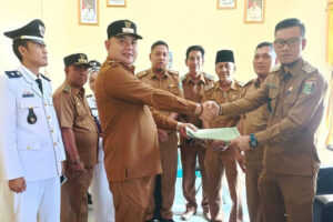 Plt. Kadis PMD Lampung Timur Hadiri PAW Kepala Desa, Dan Pengukuhan Ketua APDESI