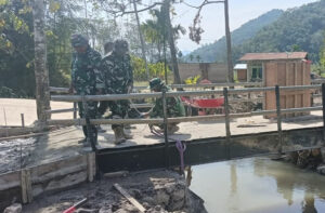 Satgas Zidam 1/ BB Rampungkan Jembatan Permanen Di Sungai Mahassan, Desa Sitolu Bahal