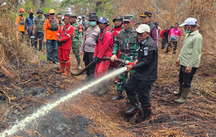Kodam XIX Tuanku Tambusai Ikuti Kegiatan Patroli Udara Dan Pemadaman Karhutla Di Lahan Gambut Di Kab. Pelalawan