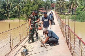 Kodim 0209/LB Tuntaskan Rehabilitasi Jembatan Perintis Garuda di Desa Rasau