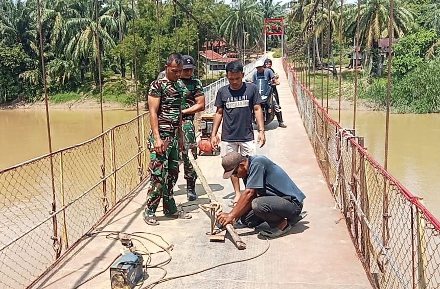 Kodim 0209/LB Tuntaskan Rehabilitasi Jembatan Perintis Garuda di Desa Rasau